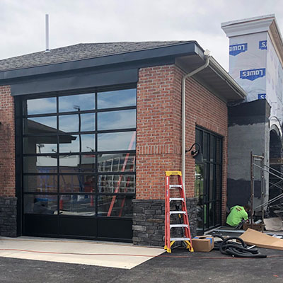 Commercial glass carwash garage door